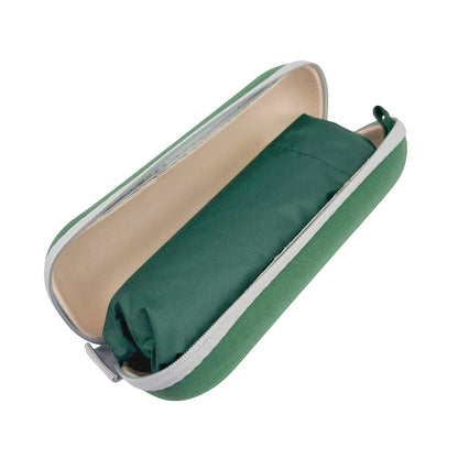 Pakabel compact green umbrella folded inside its protective zippered case. UV resistant and waterproof.