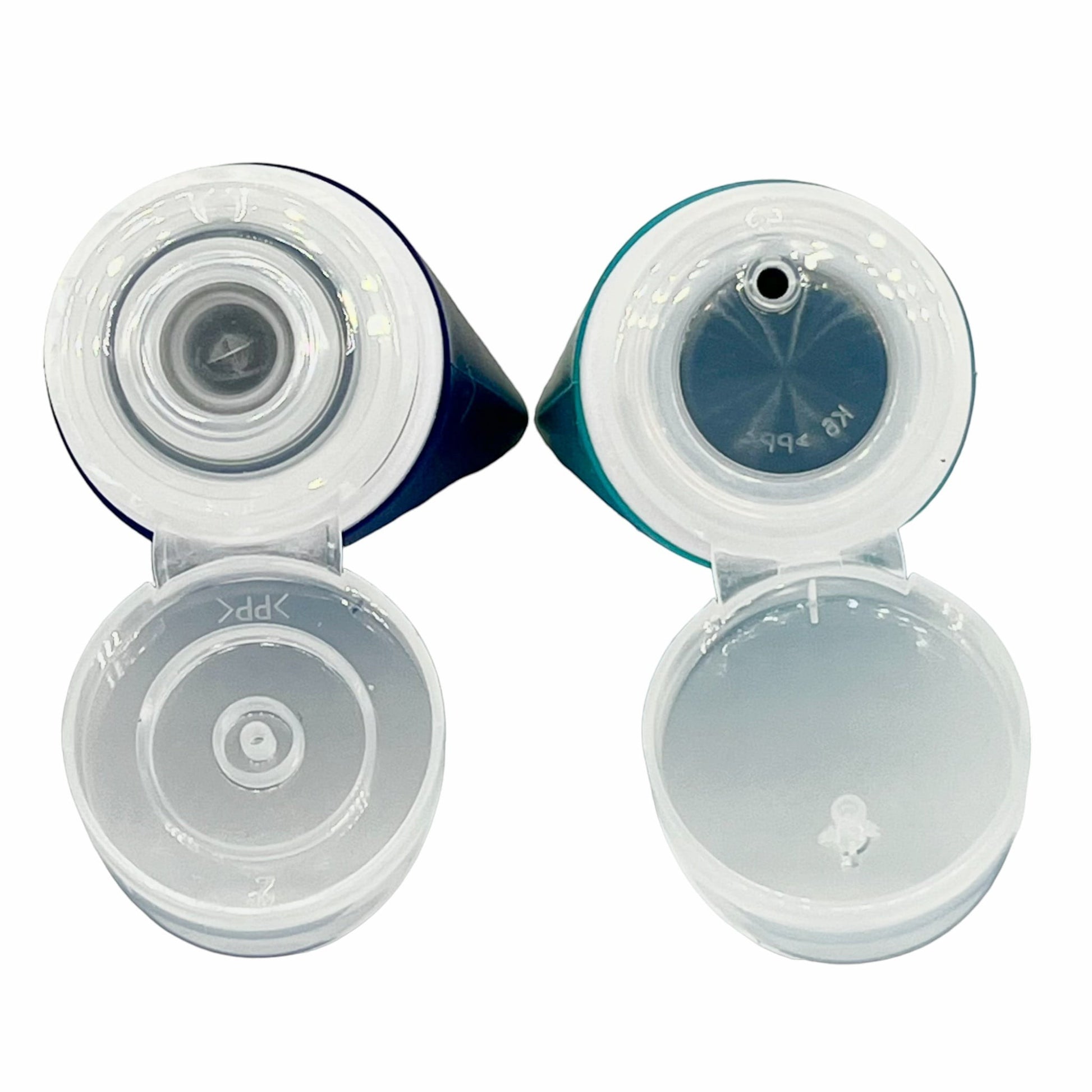 Pakabel travel toiletry bottles, dark blue and teal, with flip-top caps and wide openings for easy refilling.